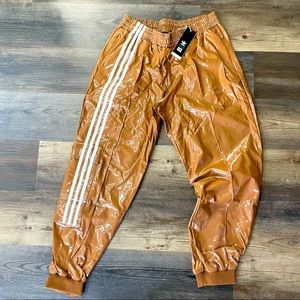 Ivy Park Wild Brown colored latex pants. Unisex size M. Brand new with tags!